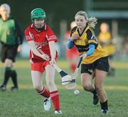 28 November 2010; Brenda O'Donoghue, Corofin, Co. Clare, in action against Niamh Coyle, Four Roads, Co. Roscommon. All-Ireland Junior Camogie Club Championship Final, Corofin, Co. Clare v Four Roads, Co. Roscommon, Duggan Park, Ballinasloe, Co. Galway. Picture credit: Ray Ryan / SPORTSFILE
