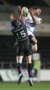 28 November 2010; Isa Nacewa, Leinster, and Barry Davies, Ospreys, contest a high ball. Celtic League, Ospreys v Leinster, Liberty Stadium, Swansea, Wales. Picture credit: Steve Pope / SPORTSFILE