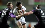 28 November 2010; Shane Horgan, Leinster, is tackled by Dan Biggar and Ian Evans, right, Ospreys. Celtic League, Ospreys v Leinster, Liberty Stadium, Swansea, Wales. Picture credit: Steve Pope / SPORTSFILE