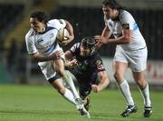 28 November 2010; Isa Nacewa, Leinster, goes past the tackle of Ian Gough, Ospreys. Celtic League, Ospreys v Leinster, Liberty Stadium, Swansea, Wales. Picture credit: Steve Pope / SPORTSFILE