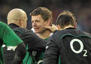 28 November 2010; Brian O'Driscoll, Ireland, receives medical attention from team doctor Dr. Eanna Falvey before being substituted. Autumn International, Ireland v Argentina, Aviva Stadium, Lansdowne Road, Dublin. Picture credit: David Maher / SPORTSFILE