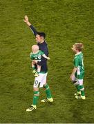 31 August 2016; Robbie Keane of Republic of Ireland, along with his sons, Robert, right, and Hudson, salutes the crowd after the Three International Friendly game between the Republic of Ireland and Oman at the Aviva Stadium in Lansdowne Road, Dublin. Photo by Daire Brennan/Sportsfile