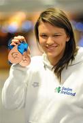 29 November 2010; Ireland's Grainne Murphy, from New Ross, Co. Wexford, on her arrival at Dublin Airport with her two bronze medals from the European Short Course Swimming Championships in the Netherlands. Dublin Airport, Dublin. Picture credit: Brendan Moran / SPORTSFILE