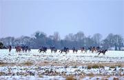 30 November 2010; A general view of horses and jockeys making their way to the gallops at the Curragh Racecourse, Co. Kildare. Picture credit: Barry Cregg / SPORTSFILE