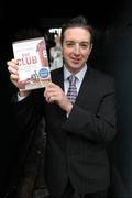 2 December 2010; &quot;The Club&quot; by Christy O'Connor has been announced as the 2010 William Hill Irish Sports Book of the Year. The Club is one of the finest books written on the subject of GAA and follows O'Connor's club, for whom he was goalkeeper, through a season in 2009 as they looked to revive past glories spurred on through personal losses and tragedy. This year’s shortlisted books included A Football Man by John Giles, Ruby by Ruby Walsh, Days of Heaven by Declan Lynch, My Story by Bernard Dunne, The Club by Christy O’Connor and Screaming at the Sky by Tony Griffin. Christy O'Connor is pictured with his book after the announcement. William Hill Bookmakers, Dame Street, Dublin. Picture credit: Brian Lawless / SPORTSFILE