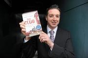 2 December 2010; &quot;The Club&quot; by Christy O'Connor has been announced as the 2010 William Hill Irish Sports Book of the Year. The Club is one of the finest books written on the subject of GAA and follows O'Connor's club, for whom he was goalkeeper, through a season in 2009 as they looked to revive past glories spurred on through personal losses and tragedy. This year’s shortlisted books included A Football Man by John Giles, Ruby by Ruby Walsh, Days of Heaven by Declan Lynch, My Story by Bernard Dunne, The Club by Christy O’Connor and Screaming at the Sky by Tony Griffin. Christy O'Connor is pictured with his book after the announcement. William Hill Bookmakers, Dame Street, Dublin. Picture credit: Brian Lawless / SPORTSFILE