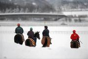 3 December 2010; A general view of a group of jockeys making their way down to sand Gallop, despite the freezing conditions, at the Curragh Racecourse, Co. Kildare. Picture credit: Barry Cregg / SPORTSFILE