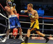 3 December 2010; Carl Frampton, right, exchanges punches with Gavin Reid during their Celtic Super Bantamweight Title Bout. Ulster Hall, Belfast, Co. Antrim. Picture credit: Oliver McVeigh / SPORTSFILE