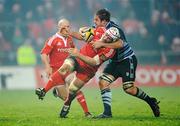 4 December 2010; Denis Leamy, Munster, is tackled by Xavier Rush, Cardiff Blues. Celtic League, Munster v Cardiff Blues, Thomond Park, Limerick. Picture credit: Brendan Moran / SPORTSFILE