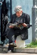 19 August 2001; Mr Bill Kelly, from Ballycumber, Offaly, reads the match programme prior to the Guinness All-Ireland Semi-final match between Kilkenny and Galway at Croke Park in Dublin. Mr Kelly will attend his 131st Final in September 2001, the only final he has missed since 1936 was the 1947 game at the Polo Grounds in New York. Photo by Ray McManus/Sportsfile