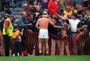 12 August 2001; Martin Storey of Wexford with supporters following his side's draw in the Guinness All-Ireland Senior Hurling Championship Semi-Final match between Tipperary and Wexford at Croke Park in Dublin. Photo by Ray McManus/Sportsfile