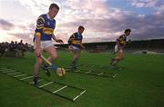 30 August 2001; Tipperary players, from left, Conor Gleeson, Eugene O'Neill and Mark O'Leary during a Tipperary hurling training session prior to the All-Ireland Hurling Final at Semple Stadium in Thurles, Tipperary. Photo by Ray McManus/Sportsfile