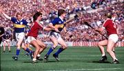 4 September 1988; Nicky English of Tipperary in action against Gerry McInerney, left, and Conor Hayes of Galway during the All-Ireland Senior Hurling Championship Final match between Galway and Tipperary at Croke Park in Dublin. Photo by Ray McManus/Sportsfile