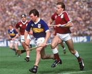 4 September 1988; Pat Fox of Tipperary in action against Ollie Kilkenny of Galway during the All-Ireland Senior Hurling Championship Final match between Galway and Tipperary at Croke Park in Dublin. Photo by Ray McManus/Sportsfile