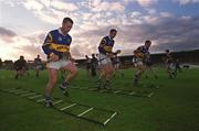 30 August 2001; Tipperary players, from left, Liam Cahill, Brian O'Meara and Eoin Kelly during a Tipperary hurling training session prior to the All-Ireland Hurling Final at Semple Stadium in Thurles, Tipperary. Photo by Ray McManus/Sportsfile