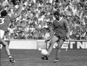 24 August 1986; Eoin &quot;Bomber&quot; Liston of Kerry scores a point despite the efforts of Mick Lyons of Meath during the All-Ireland Senior Football Championship Semi-final match between Meath and Kerry at Croke Park in Dublin. Photo by Ray McManus/Sportsfile