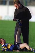 30 August 2001; Paul Kelly is assisted with stretching exercises with the help of manager Nicky English during a Tipperary hurling training session prior to the All-Ireland Hurling Final at Semple Stadium in Thurles, Tipperary. Photo by Ray McManus/Sportsfile