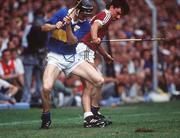 6 August 1989; Gerry McInerney of Galway in action against Paul Delaney of Tipperary during the All-Ireland Senior Hurling Championship Semi-Final match between Tipperary and Galway at Croke Park in Dublin. Photo by Ray McManus/Sportsfile