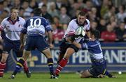31 August 2001; Justin Fitzpatrick of Ulster is tackled by Brian O'Meara, right, and Nathan Spooner of Leinster during the Celtic League match between Leinster and Ulster at Donnybrook Stadium in Dublin. Photo by Brendan Moran/Sportsfile