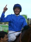 8 September 2001; Jockey Frankie Dettori on Fantastic Light celebrates after winning the Ireland The Food Island, Irish Champion Stakes, at Leopardstown Racecourse in Dublin. Photo by Ray McManus/Sportsfile