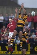 7 September 2001; Mick O'Driscoll of Munster goes up for a high ball with Simon Ralwalul of Newport during the Celtic League Pool B match between Munster and Newport Dragons at Musgrave Park in Cork. Photo by Brendan Moran/Sportsfile