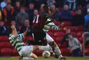7 September 2001; Mark Rutherford of Bohemians is tackled by Jason Colwell and Greg Costello of Shamrock Rovers during the eircom League Premier Division match between Bohemians and Shamrock Rovers at Dalymount Park in Dublin. Photo by David Maher/Sportsfile