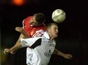 7 September 2001; Stephen O'Flynn of Cork City in action against Darragh Maguire of St. Patrick's Athletic during the eircom League Premier Division match between St. Patrick's Athletic and Cork City at Richmond Park in Dublin. Photo by Damien Eagers/Sportsfile