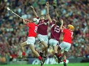 9 September 2001; Kevin Hartnett, 8, and Michael Prout of Cork in action against Johnnie Maher, left, and Kenneth Burke of Galway during the All-Ireland Minor Hurling Championship Final between Cork and Galway at Croke Park in Dublin. Photo by Ray McManus/Sportsfile