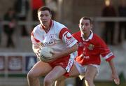 9 September 2001; Enda McGinley of Tyrone in action against Diarmuid Duggan of Cork during the All-Ireland Under 21 Football Championship Semi-Final match between Tyrone and Cork at Parnell Park in Dublin. Photo by David Maher/Sportsfile