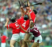 9 September 2001; Joe Gantley of Galway in action against Shane Murphy, 5, Kevin Goggin, 4, and John Gardiner of Cork during the All-Ireland Minor Hurling Championship Final between Cork and Galway at Croke Park in Dublin. Photo by Brendan Moran/Sportsfile