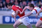 9 September 2001; David Niblock of Cork in action against Cormac McAnallen of Tyrone during the All-Ireland Under 21 Football Championship Semi-Final match between Tyrone and Cork at Parnell Park in Dublin. Photo by David Maher/Sportsfile