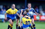8 September 2001; Adam Magro of Leinster is tackled by Cerith Rees of Bridgend during the Celtic League match between Bridgend and Leinster at the Brewery Field at Bridgend, Wales. Photo by Matt Browne/Sportsfile