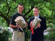 10 September 2001; Tipperary captain Thomas Dunne, left, with the Liam MacCarthy cup, and Cork minor captain Tomas O'Leary with the Irish Press trophy outside the Burlington Hotel following their side's success in the All-Ireland Senior and Minor Hurling Championship Finals. Photo by Brendan Moran/Sportsfile