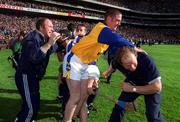 9 September 2001; Tipperary's John Leahy, left, sub goalkeeper Darragh Rabbitte and selector Jack Bergin celebrate at the final whistle of the Guinness All-Ireland Senior Hurling Championship Final match between Tipperary and Galway at Croke Park in Dublin. Photo by Aoife Rice/Sportsfile
