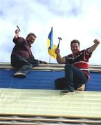 10 September 2001; Two Tipperary builders celebrate their county's victory during the All-Ireland hurling champions Tipperary homecoming in Thurles, Tipperary. Photo by Damien Eagers/Sportsfile