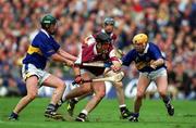 9 September 2001; Joe Rabbitte of Galway in action against David Kennedy, left, and Paul Ormonde of Tipperary during the Guinness All-Ireland Senior Hurling Championship Final match between Tipperary and Galway at Croke Park in Dublin. Photo by Brendan Moran/Sportsfile