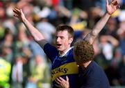 9 September 2001; David Kennedy of Tipperary celebrates with selector Jack Bergin following their victory in the Guinness All-Ireland Senior Hurling Championship Final match between Tipperary and Galway at Croke Park in Dublin. Photo by Brendan Moran/Sportsfile