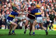 9 September 2001; Joe Rabbitte of Galway is tackled by David Kennedy, left, and Paul Ormonde of Tipperary during the Guinness All-Ireland Senior Hurling Championship Final match between Tipperary and Galway at Croke Park in Dublin. Photo by Brendan Moran/Sportsfile