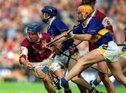 9 September 2001; Kevin Broderick of Galway is tackled by Paul Ormonde, right, and Paul Kelly of Tipperary during the Guinness All-Ireland Senior Hurling Championship Final match between Tipperary and Galway at Croke Park in Dublin. Photo by Brendan Moran/Sportsfile