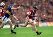 9 September 2001; Liam Hodgins of Galway races away from Lar Corbett of Tipperary during the Guinness All-Ireland Senior Hurling Championship Final match between Tipperary and Galway at Croke Park in Dublin. Photo by Aoife Rice/Sportsfile