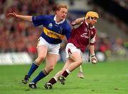 9 September 2001; Brian Higgins of Galway in action against Declan Ryan of Tipperary during the Guinness All-Ireland Senior Hurling Championship Final match between Tipperary and Galway at Croke Park in Dublin. Photo by Aoife Rice/Sportsfile