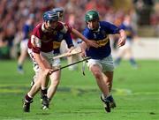 9 September 2001; Mark Kerins of Galway in action against David Kennedy of Tipperary during the Guinness All-Ireland Senior Hurling Championship Final match between Tipperary and Galway at Croke Park in Dublin. Photo by Damien Eagers/Sportsfile