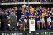 9 September 2001; The Tipperary team celebrate with the Liam MacCarthy cup following their victory in the Guinness All-Ireland Senior Hurling Championship Final match between Tipperary and Galway at Croke Park in Dublin. Photo by Aoife Rice/Sportsfile