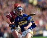 9 September 2001; Eoin Kelly of Tipperary in action against Ollie Canning of Galway during the Guinness All-Ireland Senior Hurling Championship Final match between Tipperary and Galway at Croke Park in Dublin. Photo by Aoife Rice/Sportsfile