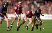 9 September 2001; Kevin Broderick of Galway in action against Thomas Dunne, right, and David Kennedy of Tipperary during the Guinness All-Ireland Senior Hurling Championship Final match between Tipperary and Galway at Croke Park in Dublin. Photo by Damien Eagers/Sportsfile