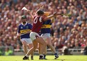 9 September 2001; Joe Rabbitte of Galway is tackled by Paul Kelly of Tipperary during the Guinness All-Ireland Senior Hurling Championship Final match between Tipperary and Galway at Croke Park in Dublin. Photo by Ray McManus/Sportsfile