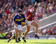 9 September 2001; Joe Rabbitte of Galway is tackled by Paul Kelly of Tipperary during the Guinness All-Ireland Senior Hurling Championship Final match between Tipperary and Galway at Croke Park in Dublin. Photo by Ray McManus/Sportsfile