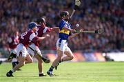 9 September 2001; Thomas Dunne of Tipperary in action against Kevin Broderick, left, and Alan Kerins of Galway during the Guinness All-Ireland Senior Hurling Championship Final match between Tipperary and Galway at Croke Park in Dublin. Photo by Aoife Rice/Sportsfile