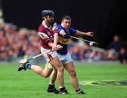9 September 2001; Liam Hodgins of Galway in action against John Carroll of Tipperary during the Guinness All-Ireland Senior Hurling Championship Final match between Tipperary and Galway at Croke Park in Dublin. Photo by Damien Eagers/Sportsfile