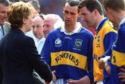 9 September 2001; President of Ireland Mary McAleese is introduced to the goalkeeper Brendan Cummins, by team captain Thomas Dunne, prior to the Guinness All-Ireland Senior Hurling Championship Final match between Tipperary and Galway at Croke Park in Dublin. Photo by Ray McManus/Sportsfile
